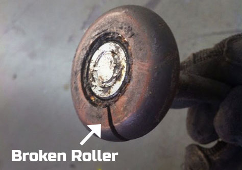 broken garage door roller repair